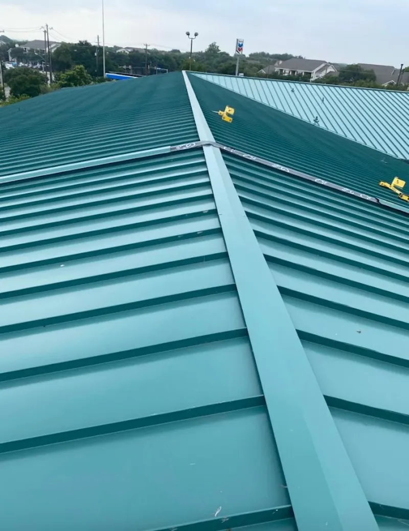 Green commercial metal roof ridge and valley for Metal Roof Repair in Umatilla